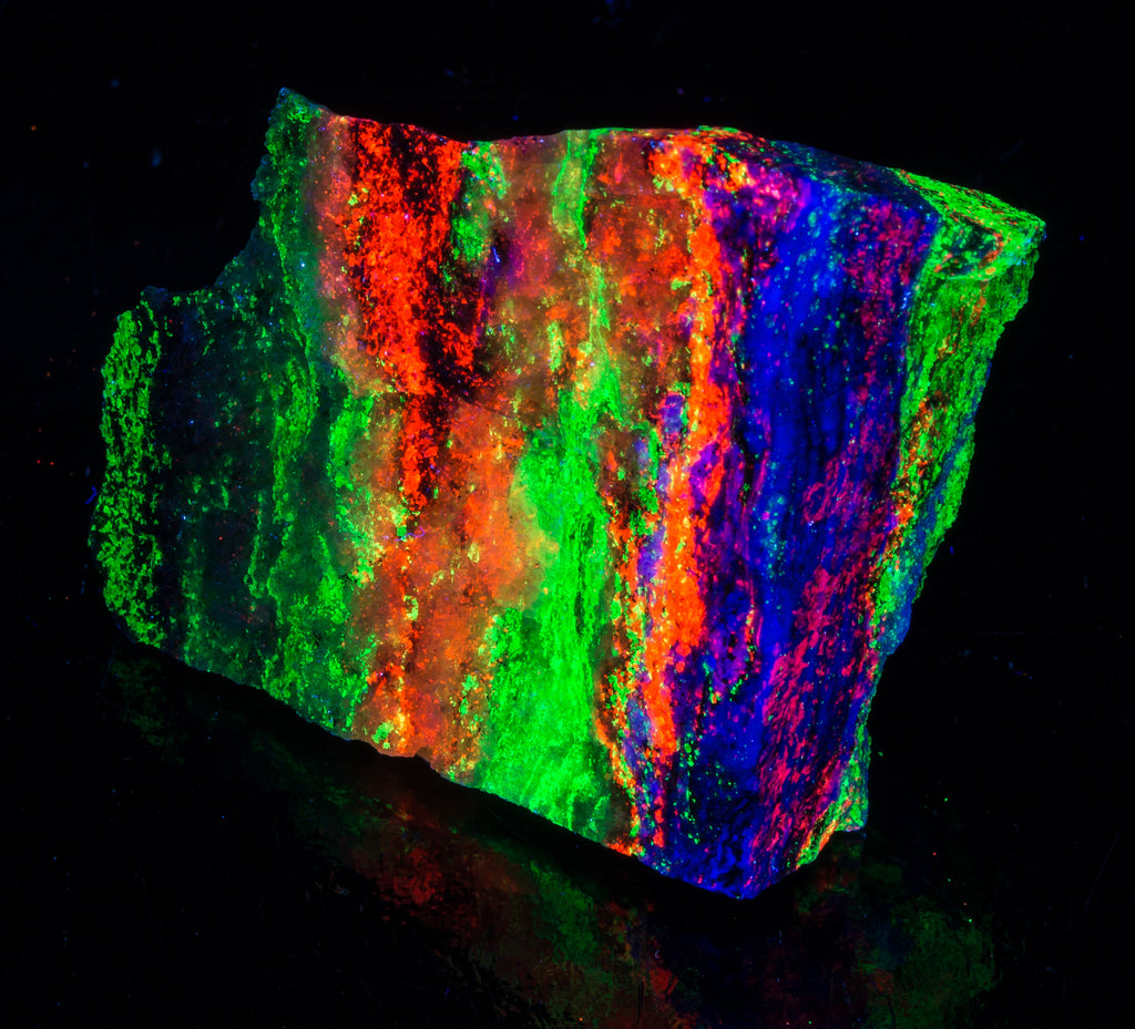 blue fluorite, green willemite, red calcite under uv light