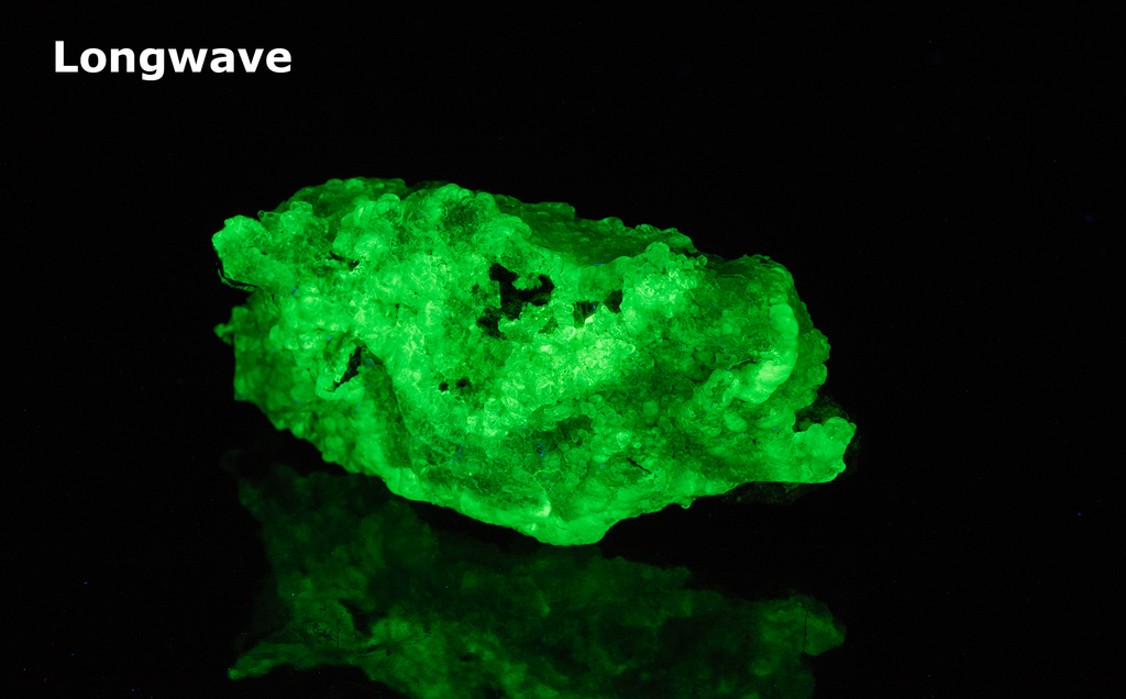 glassy bubbles of hyalite opal that are brightly fluorescent under all wavelengths