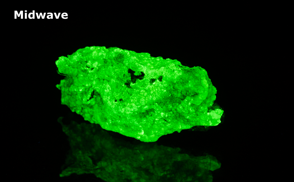 glassy bubbles of hyalite opal that are brightly fluorescent under all wavelengths