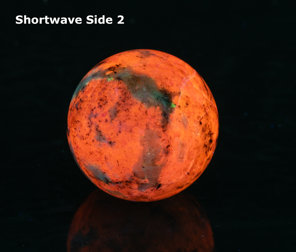 fluorescent sodalite sphere with deep tenebrescence