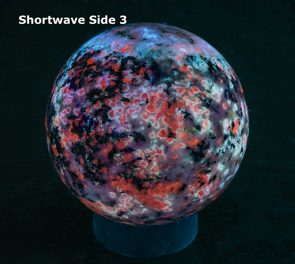 Fantasy rock sphere with sodalite, tugtupite, chkalovite, analcime from greenland. Tenebrescent.