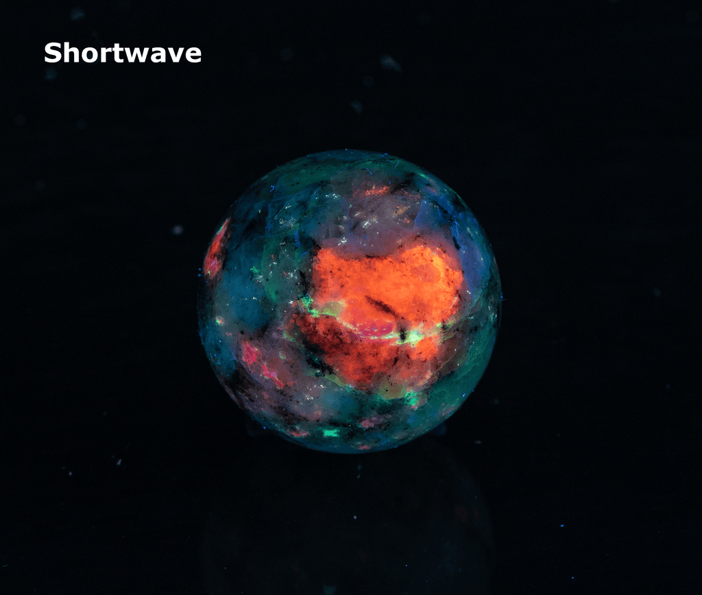 Fluorescent Sodalite Hackmanite Sphere from Greenland with Tenebrescence