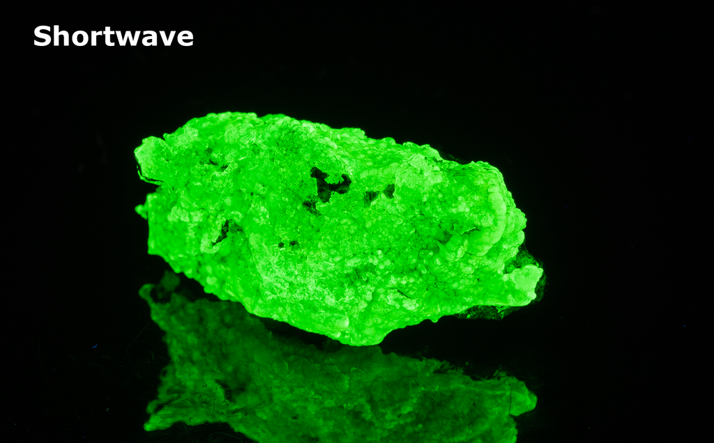 glassy bubbles of hyalite opal that are brightly fluorescent under all wavelengths