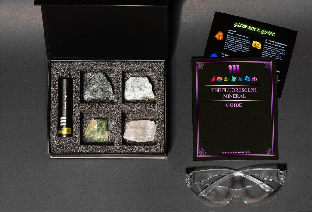 fluorescent mineral kit with fluorescent sodalite or yooperlite, wernerite, fluorite, calcite with a UV flashlight