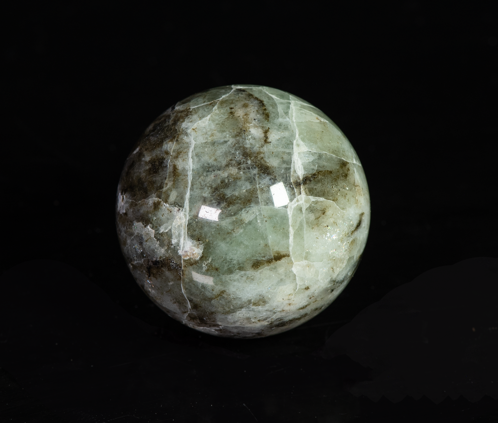 fluorescent sodalite sphere with deep tenebrescence