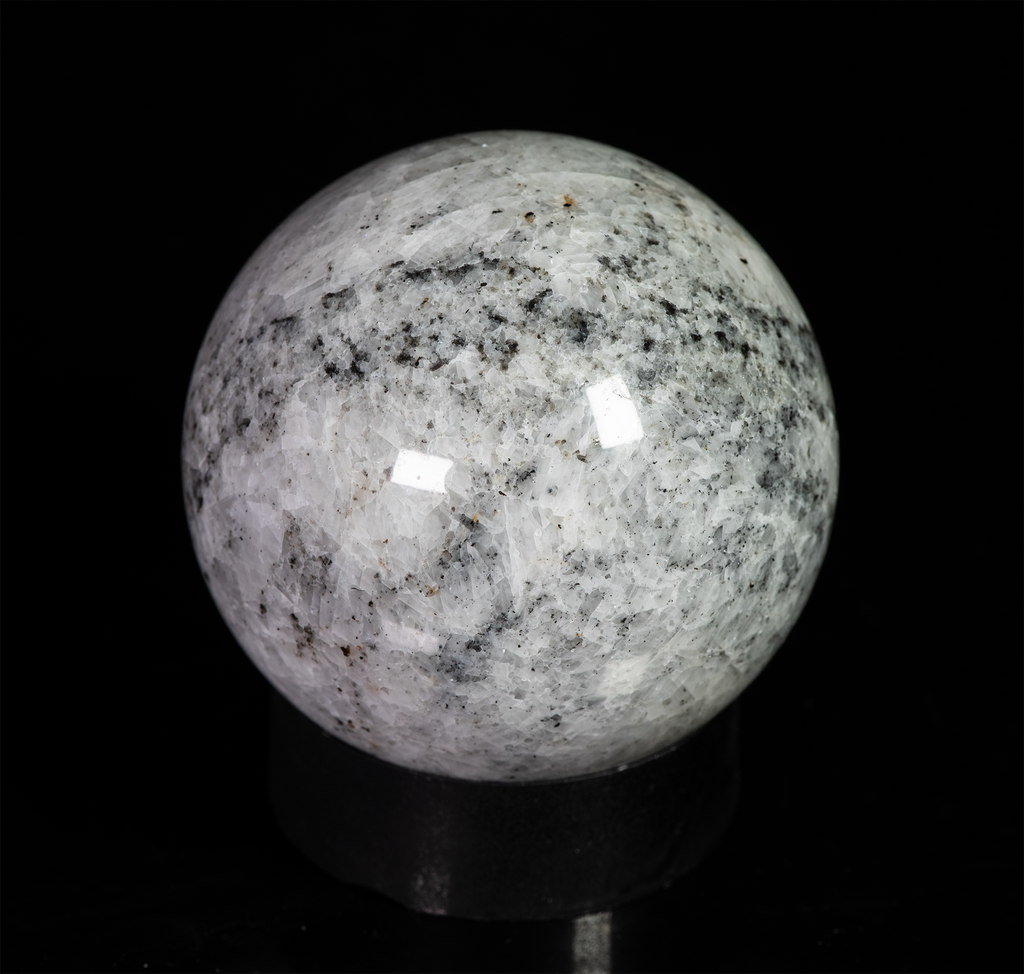 Chondrodite, blue diopside, calcite sphere from Canada