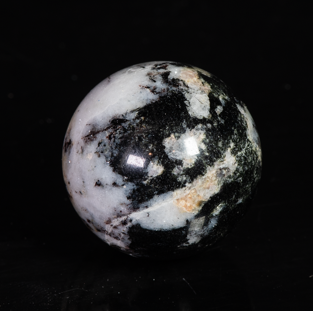 A Tugtupite Sphere with Silver Polylithionite | MinerShop