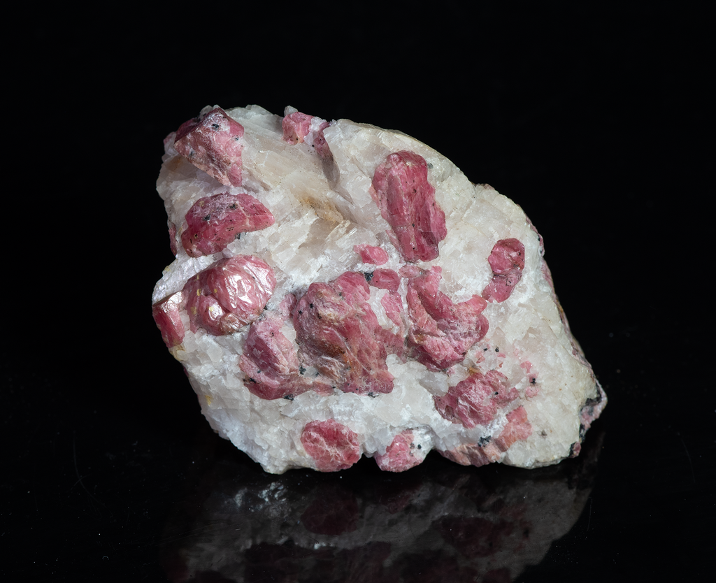 Deep Pink Rhodonite Crystals with Fluorescing Calcite from Franklin Mine